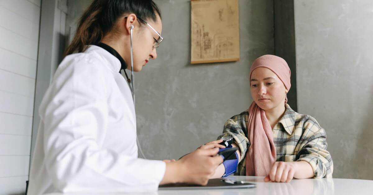 oncologist doctor looking the patient